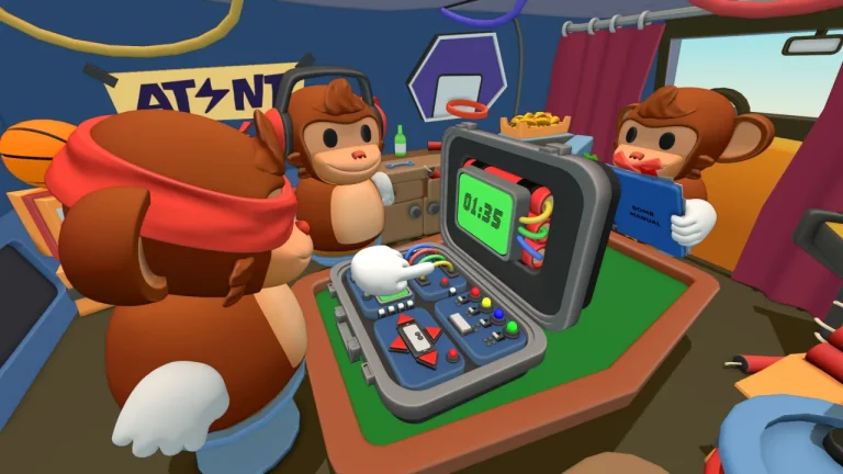 Three cartoon monkeys crowded around an open briefcase bomb inside a cluttered toy-like van workshop in BOMBANANA. The monkey on the left wears a red blindfold and reaches toward the bomb’s control panel of coloured wires and buttons, a headphoned monkey sits behind it, and on the right a monkey with a red gag taped over its mouth holds up a blue book labelled BOMB MANUAL. The bomb’s green screen reads 01:35.