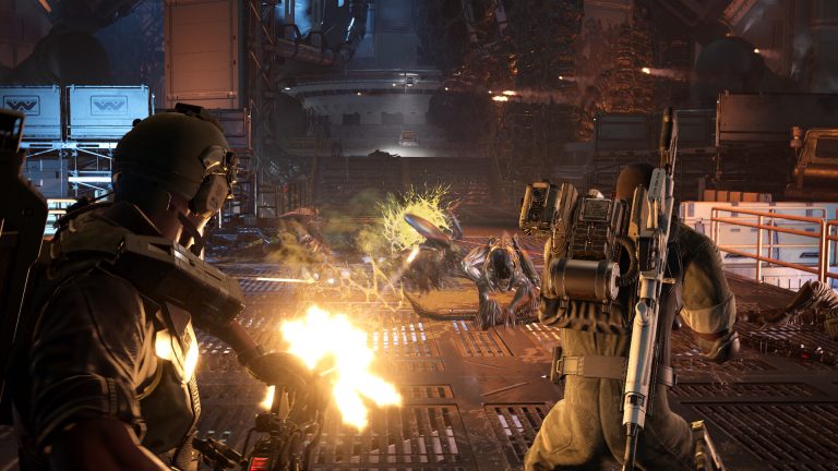 Aliens Fireteam Elite 2 Marines firing together in a Xenomorph corridor