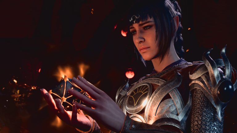 Shadowheart holding a glowing artefact in an official Baldur's Gate 3 screenshot