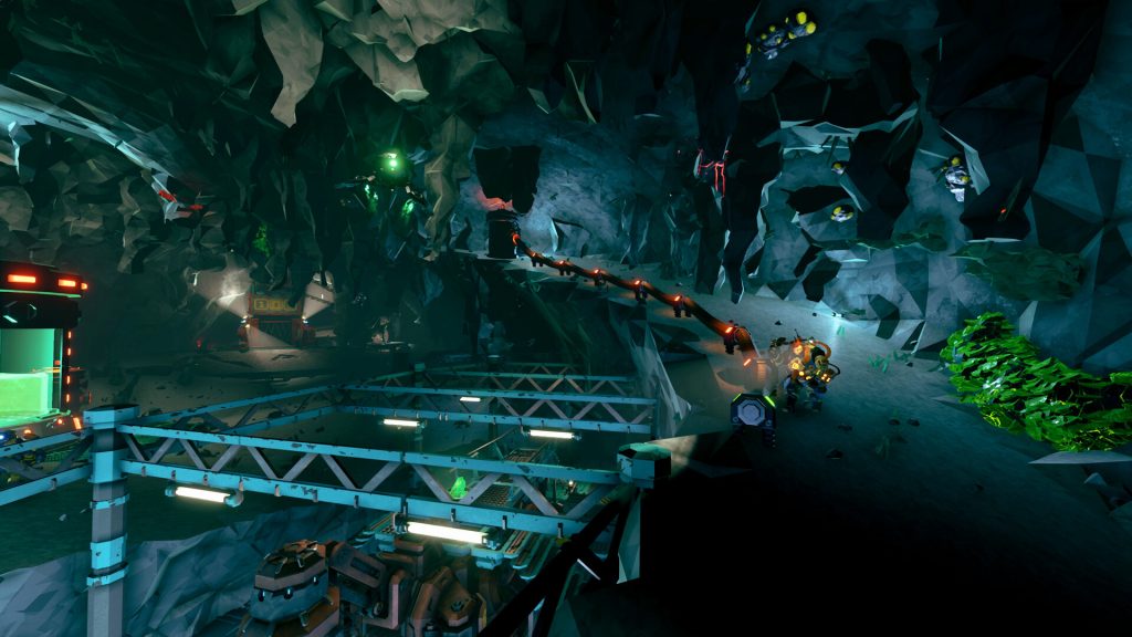A Rogue Core squad following a powered cable through a cavern toward the elevator