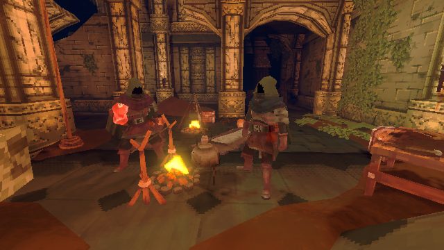 A campfire, sleeping bag and storage chest in the large hall.