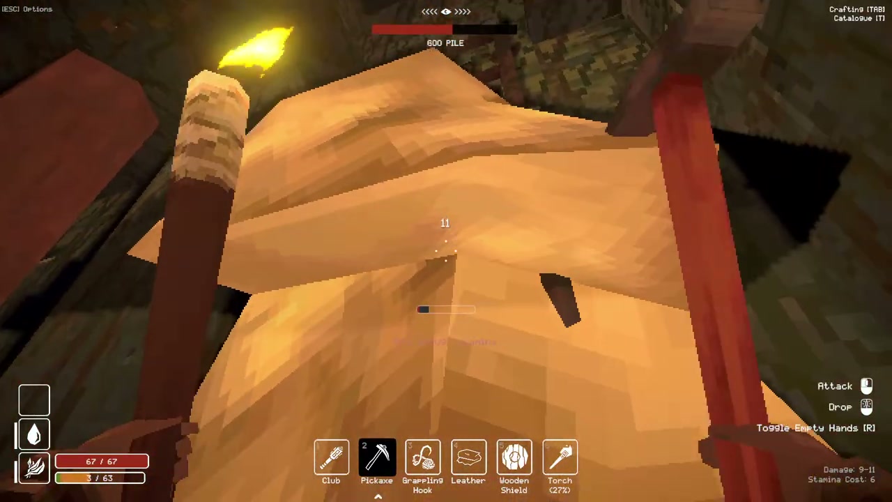 A Pickaxe striking a yellow Goo Pile, with its health bar visible.