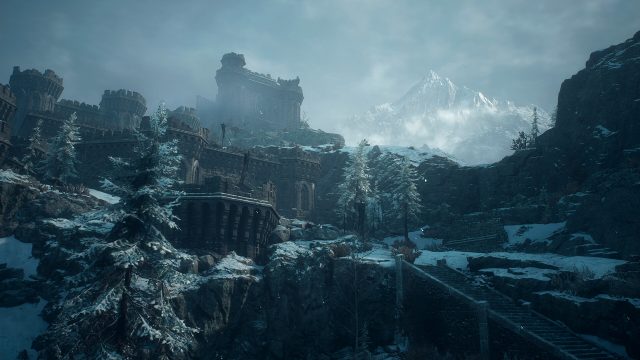 Snow-covered castle ruins and a waterfall in Norgan