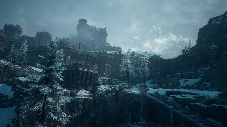 Snow-covered castle ruins and a waterfall in Norgan