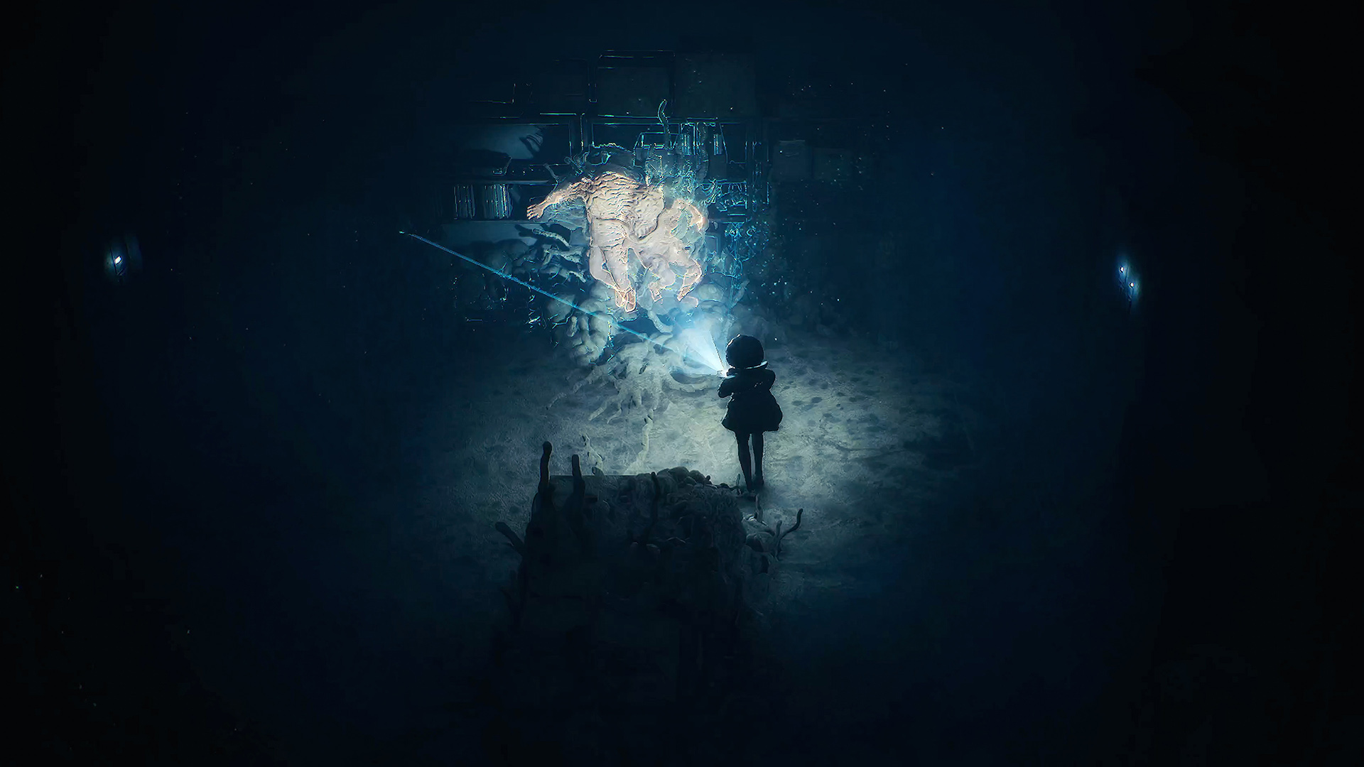 A swollen creature covered in growths faces Cel in a dark chamber