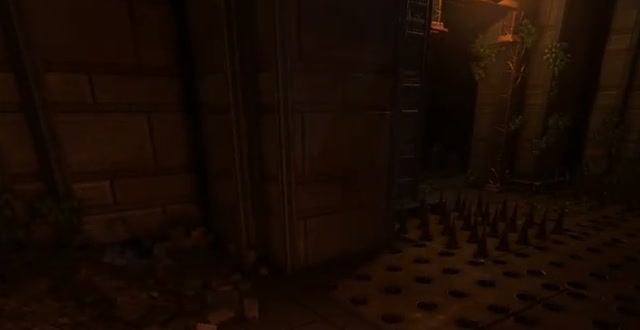 The staged spike floor on the Farmer vault's upper button route.