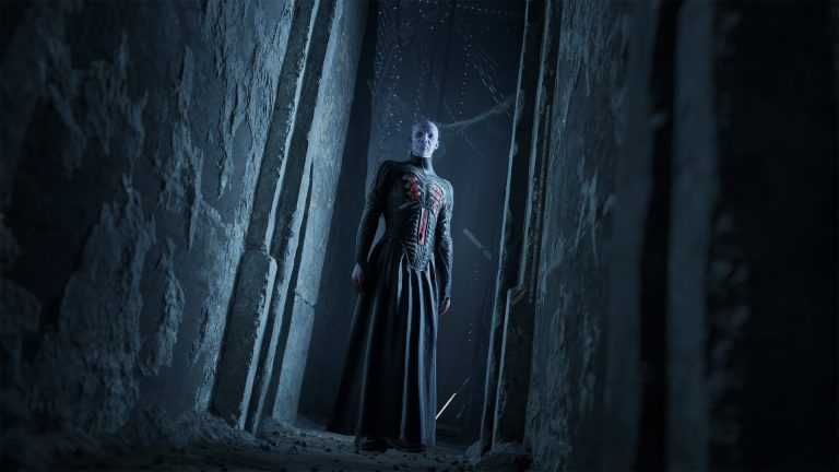 The Hell Priest standing in a candlelit corridor