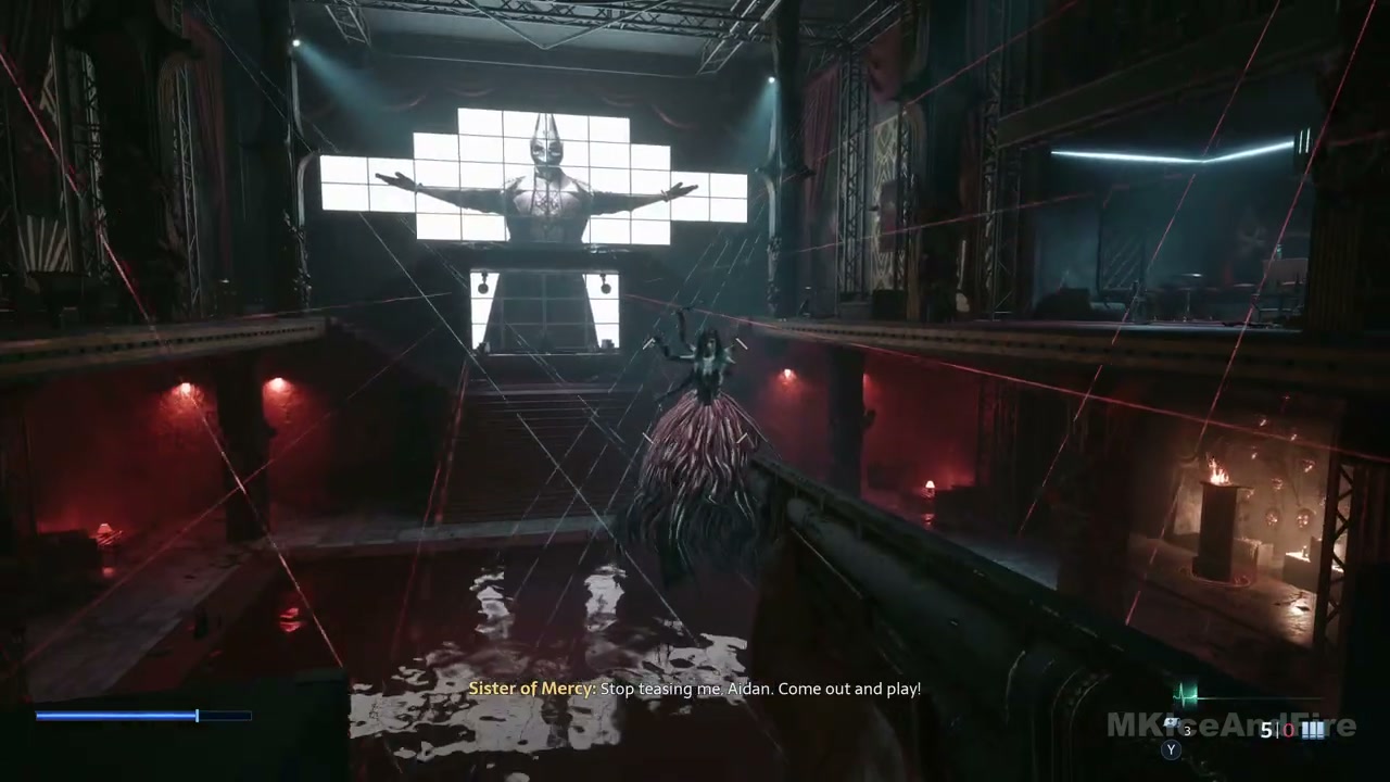 The Sister of Mercy in the center of the dance floor with pillars to either side